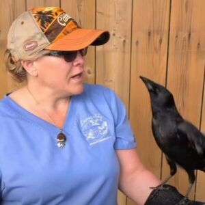 Tammy and Edgar, one of our educators and animal ambassadors who delivers our wildlife education programs.